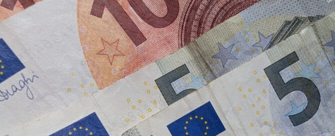 Used Euro notes in denominations of 5 euro and 10 euro. Photo by Jason Elliott.