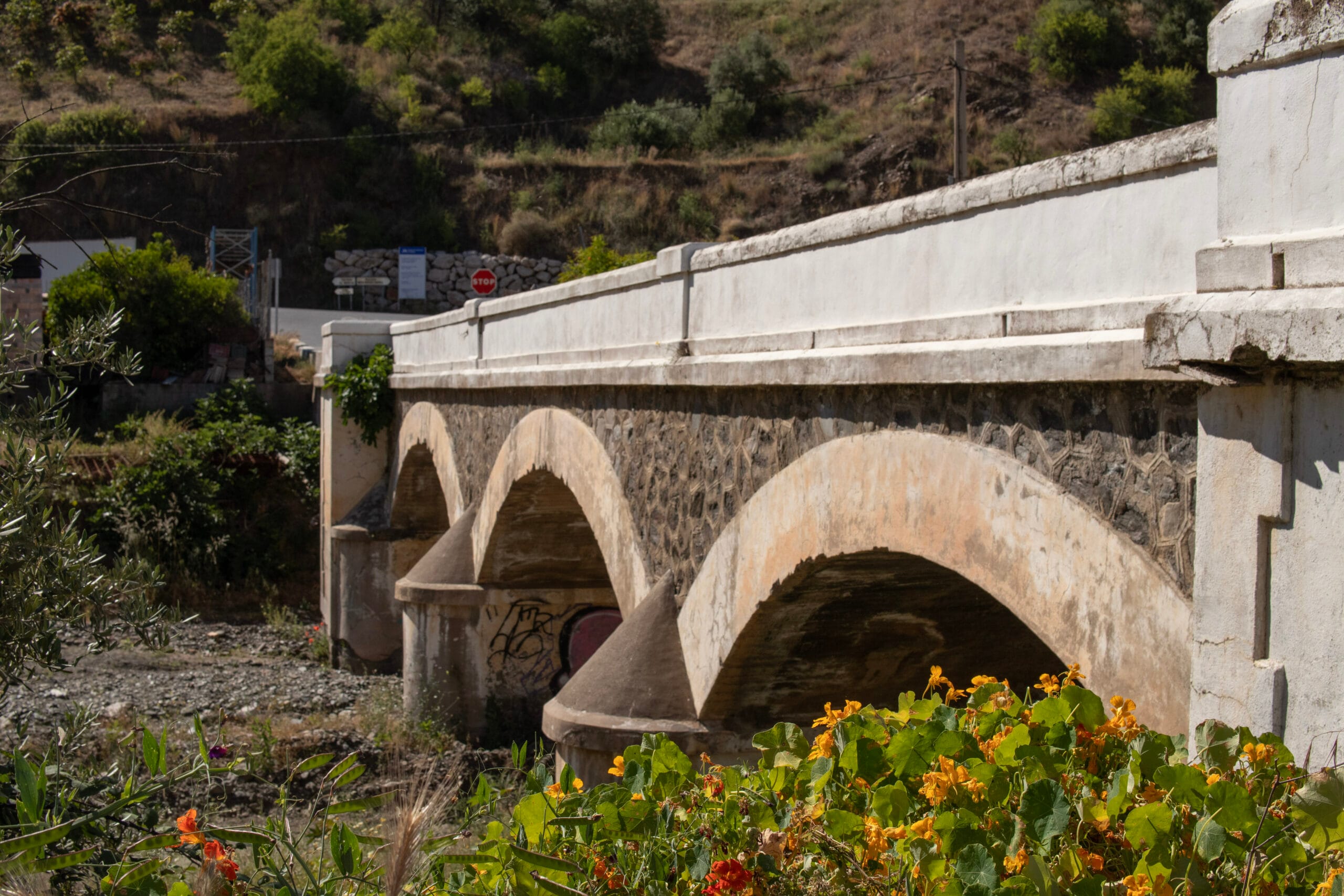 A photograph of a bridge over a dry river bed in Almachar, taken by Jason Elliott for the eastofmalaga.com website. A photograph of a bridge over a dry river bed in Almachar, taken by Jason Elliott for the eastofmalaga.com website.