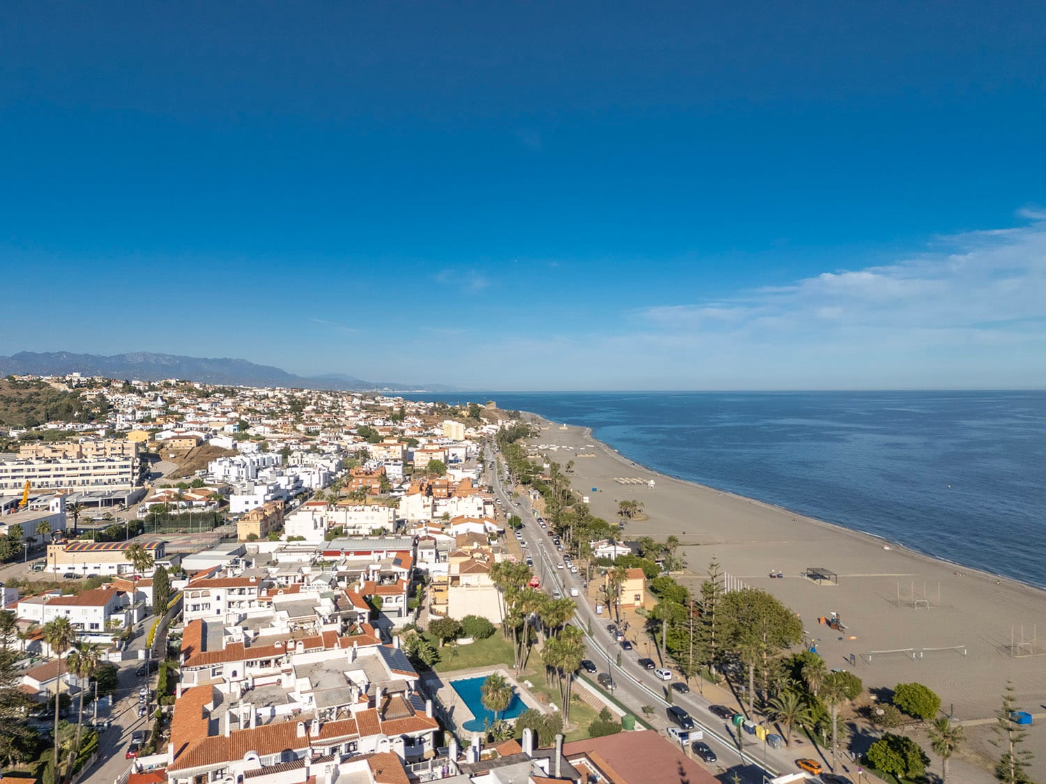 An aerial photograph looking across the town of Benajarafe and out to sea by Jason Elliott for the eastofmalaga.com website An aerial photograph looking across the town of Benajarafe and out to sea by Jason Elliott for the eastofmalaga.com website