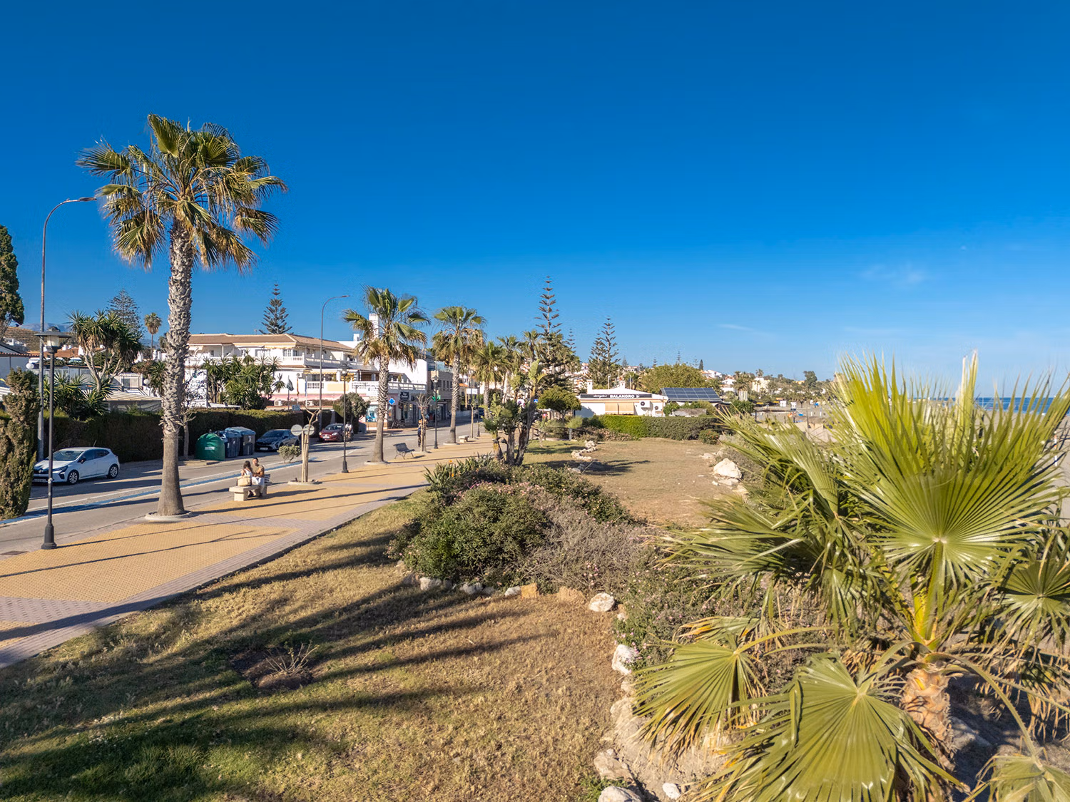 Looking east along the promenade of Benajarafe. Photo by Jason Elliott for the eastofmalaga.com website